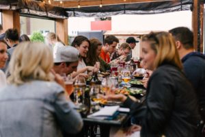 People in a cafe eating and talking